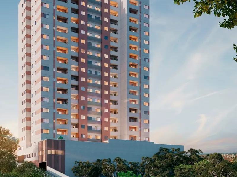 Torre do Self Residence ao entardecer, com as janelas iluminadas