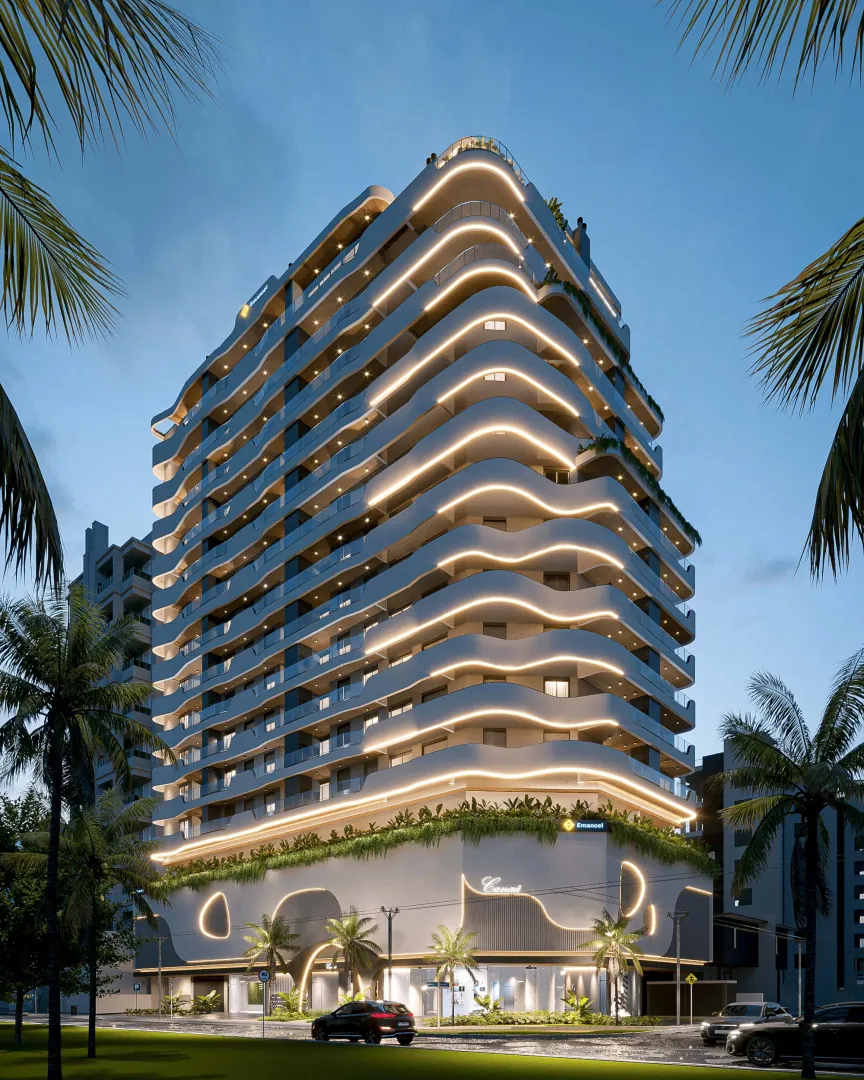Torre do Canaã Residence à noite, com sacadas curvas contornadas por fitas de luz e jardins suspensos na base