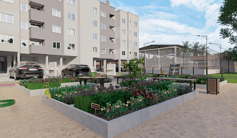Horta comunitária do Garden Club Residence II, com canteiros elevados e os blocos de apartamentos ao fundo