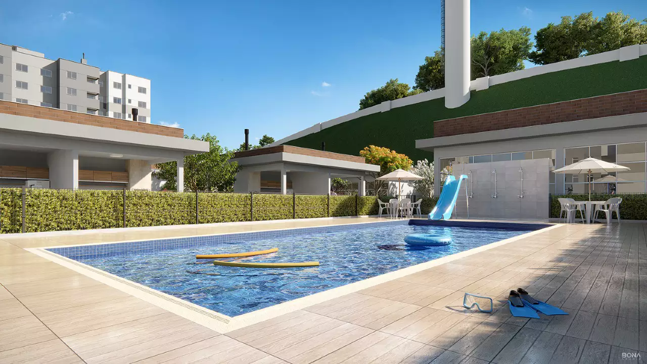 Piscina infantil do Garden Club Residence, com escorregador e boias