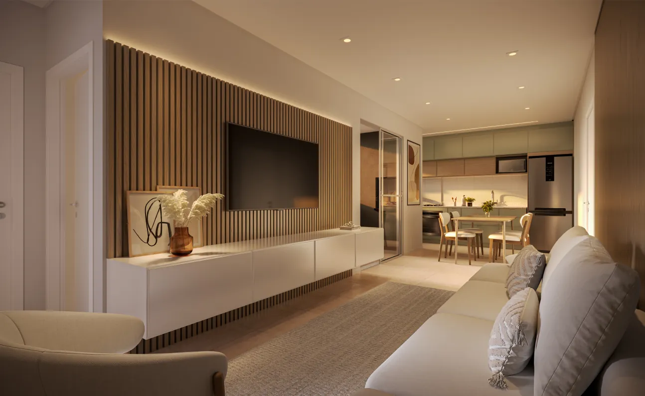 Living de um apartamento do Grand Life Residence, com painel ripado, TV e cozinha integrada ao fundo