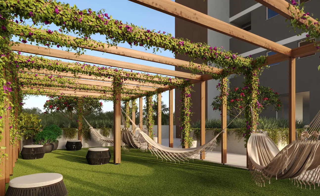 Redário do Grand Life Residence, com redes sob pergolado florido e gramado
