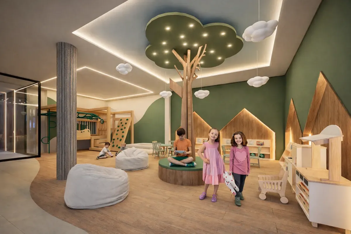 Brinquedoteca do Kairós Residence com árvore cenográfica, casinhas de madeira e crianças brincando