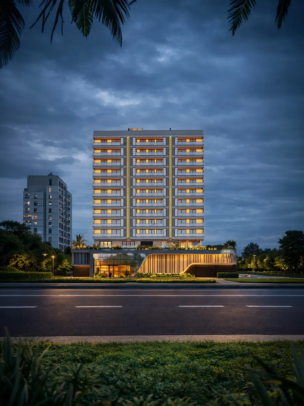 Torre do Kairós Residence iluminada ao anoitecer, com sacadas amplas e embasamento curvo