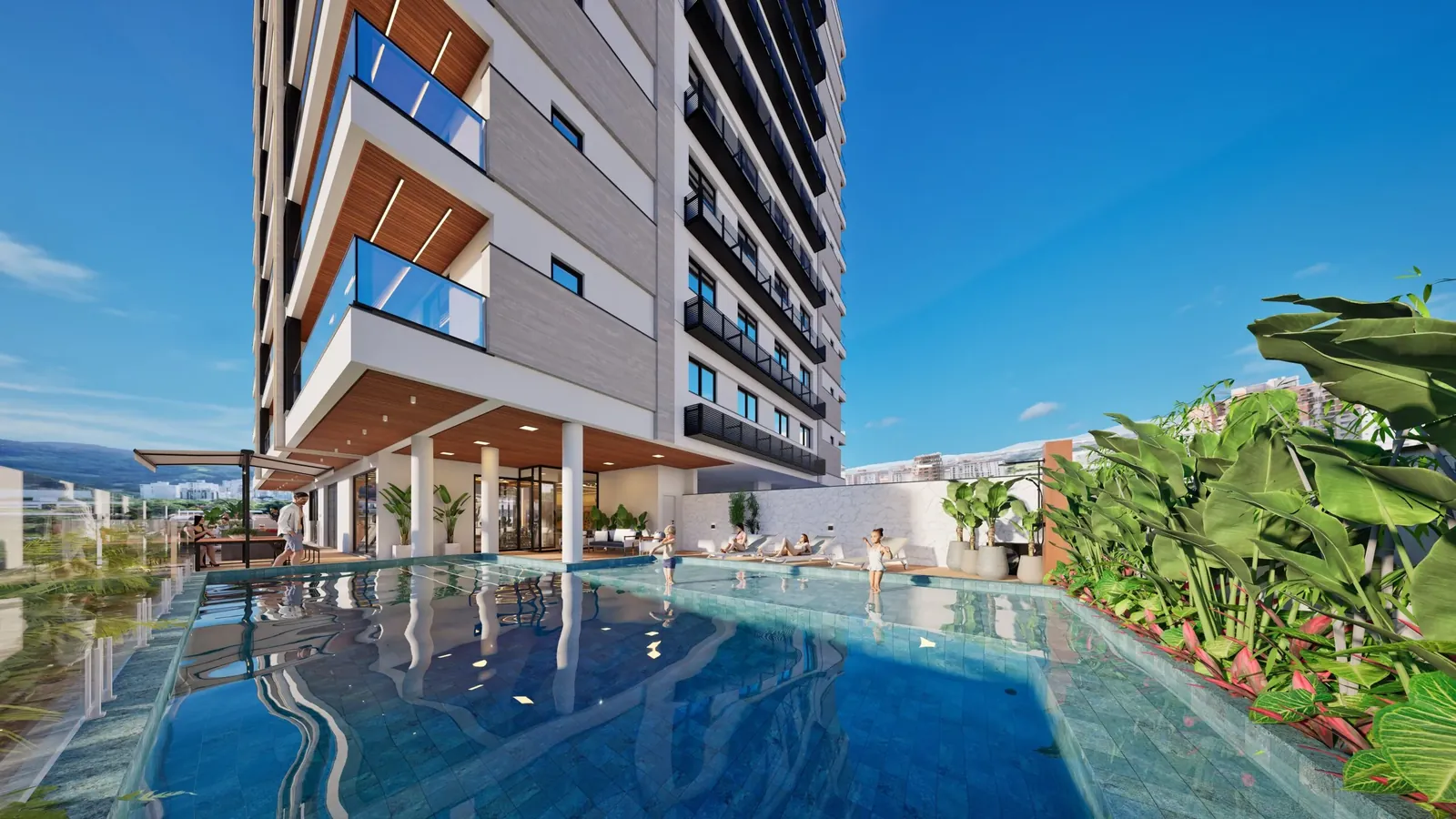 Piscina aquecida do Kairós Residence com borda de vidro, deck e jardim tropical ao pé da torre