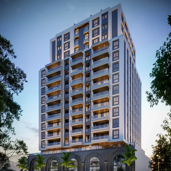 Dubai Residence, da Koski, torre com fachada azulada e embasamento em arcos