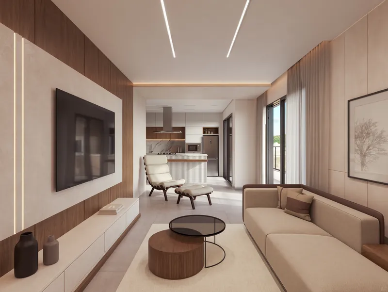 Living com sofá claro, painel de TV e cozinha integrada ao fundo