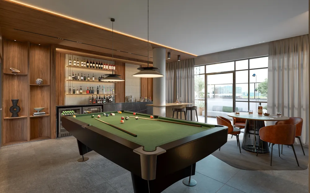 Pub e sala de jogos do New York Residence, com mesa de sinuca, bar com prateleiras iluminadas e janelas amplas