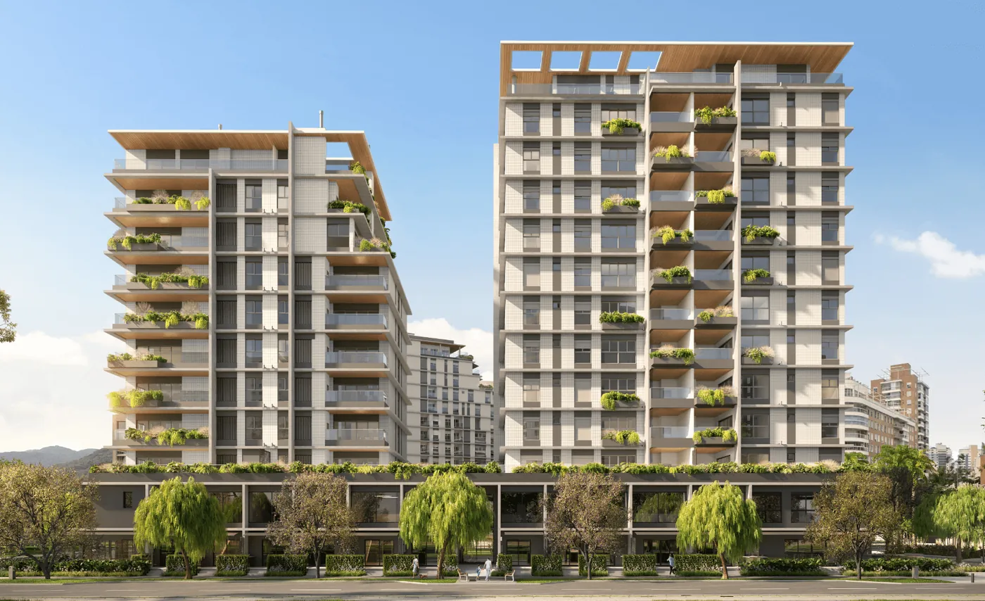 Torres do Pátio das Artes com terraços escalonados cheios de vegetação e o térreo arborizado