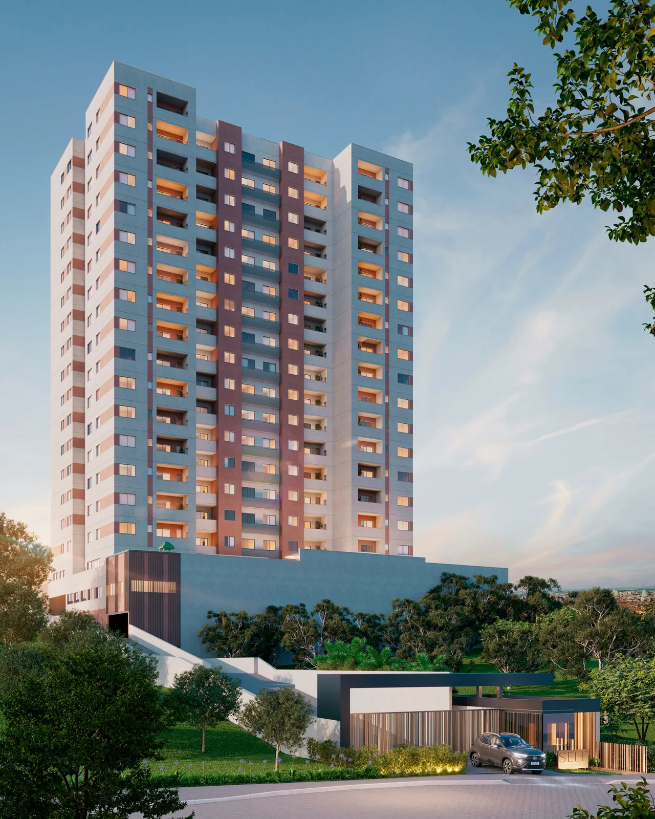 Torre única do Self Residence, com fachada colorida em tons de azul, rosa e terracota, cercada de verde